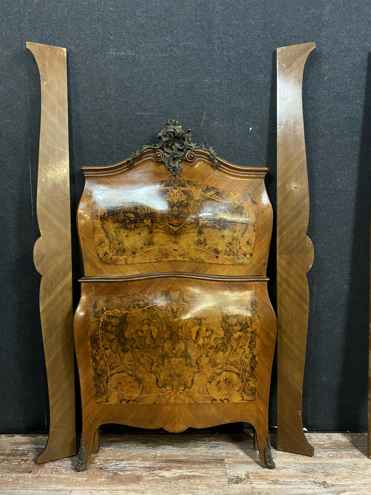 Pair of Louis XV curved beds all faces in walnut bramble and precious wood