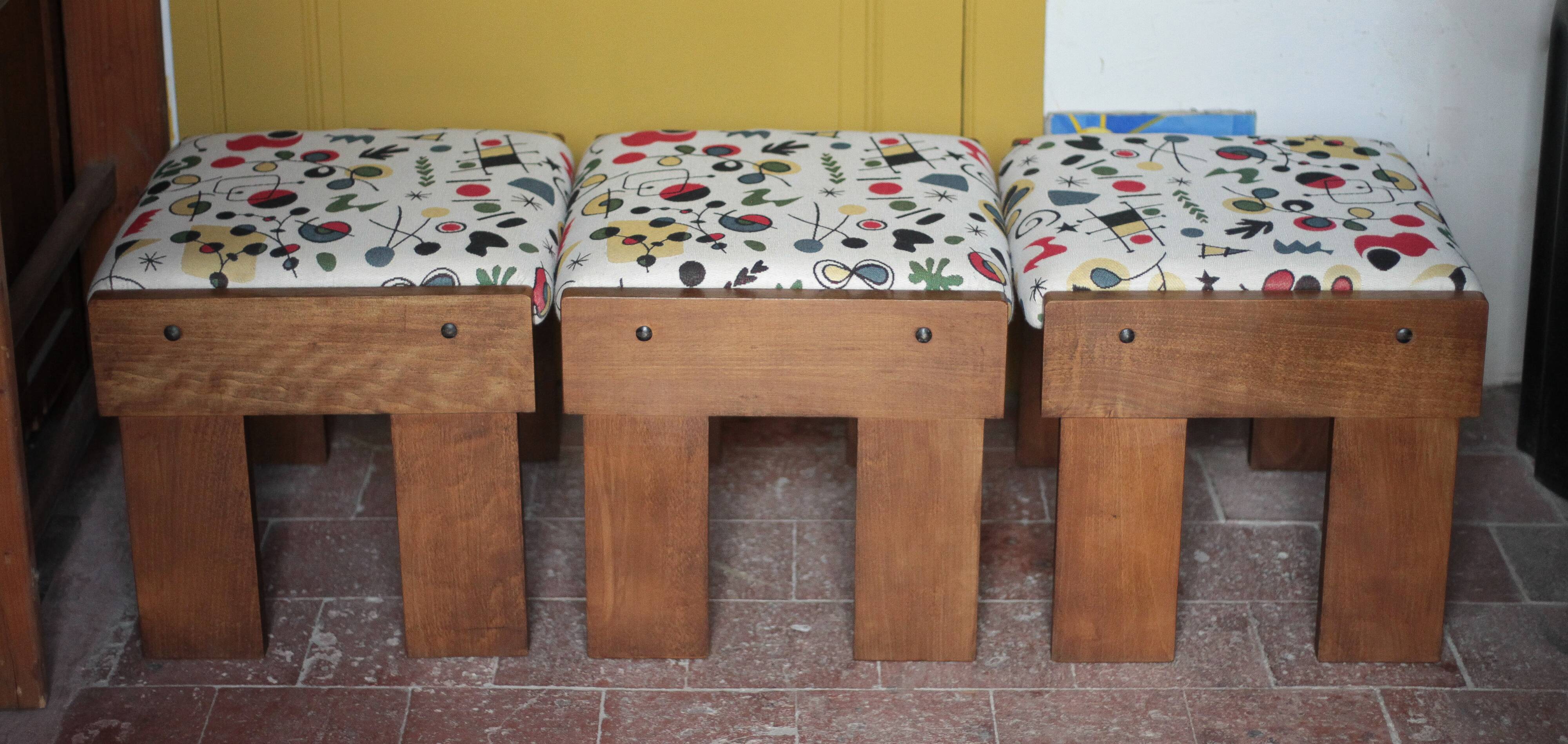 Set of 3 beech wood stools with fabric upholstery in the style of Miro.