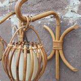 Pair of Louis Sognot rattan wall lights.