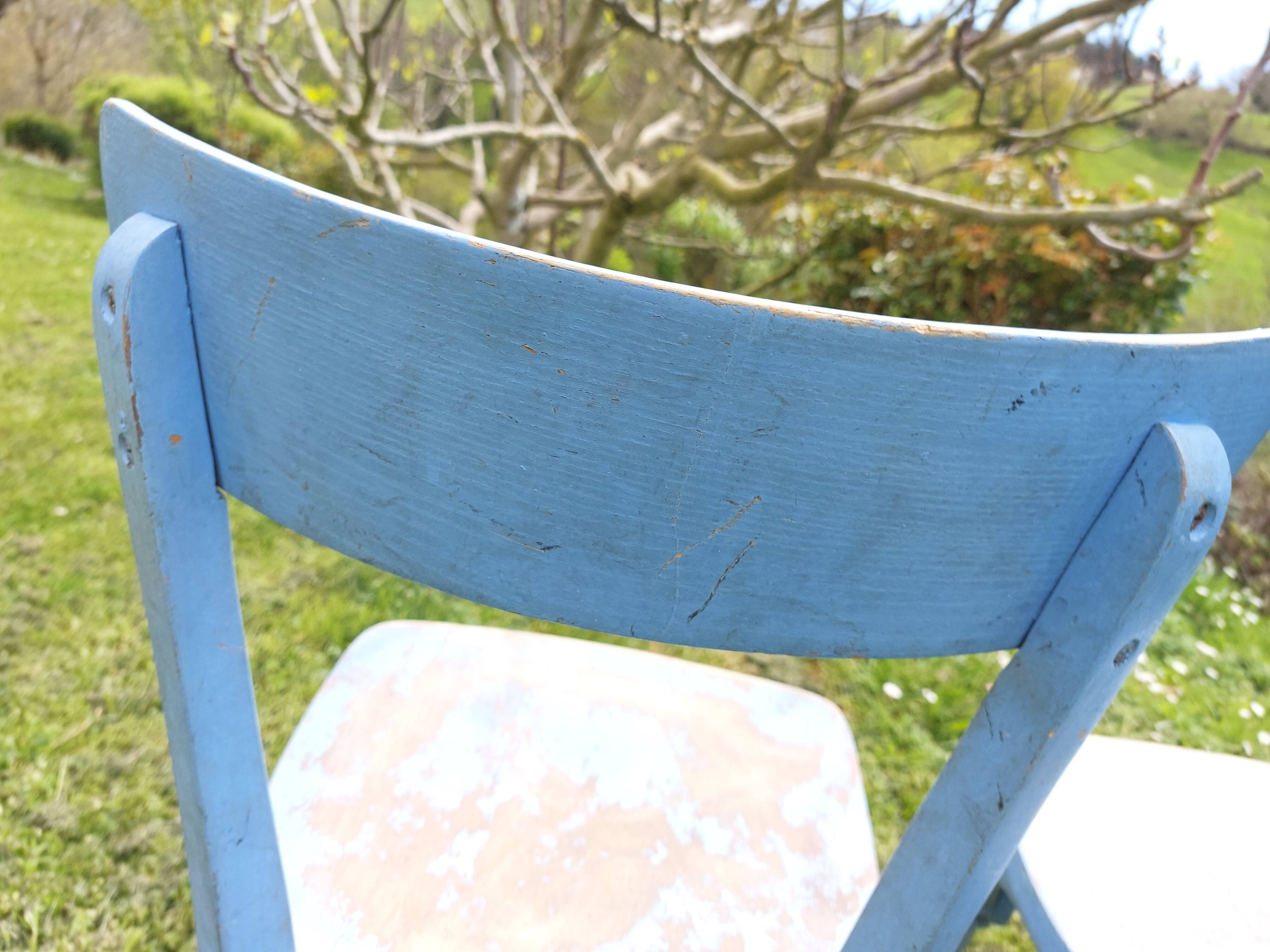 pair of chippy blue paint bistro chairs