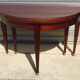 Half-moon console table, extendable in Empire style.