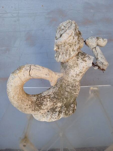 Gargoyle in cement mermaid bugle cathedral ep 1950