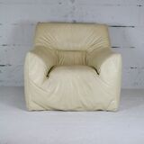 Leather armchair and cream-coloured foam, France , circa 1970