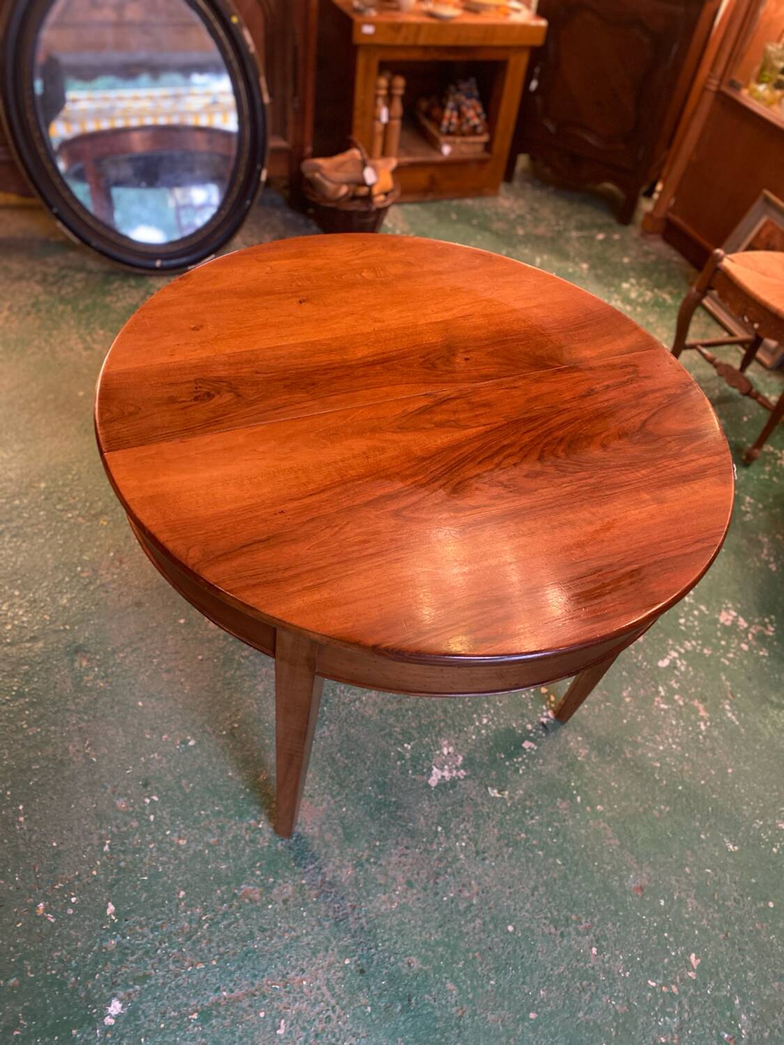 Louis XVI style oval walnut extendable table
