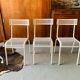 Series of 3 perforated metal chairs