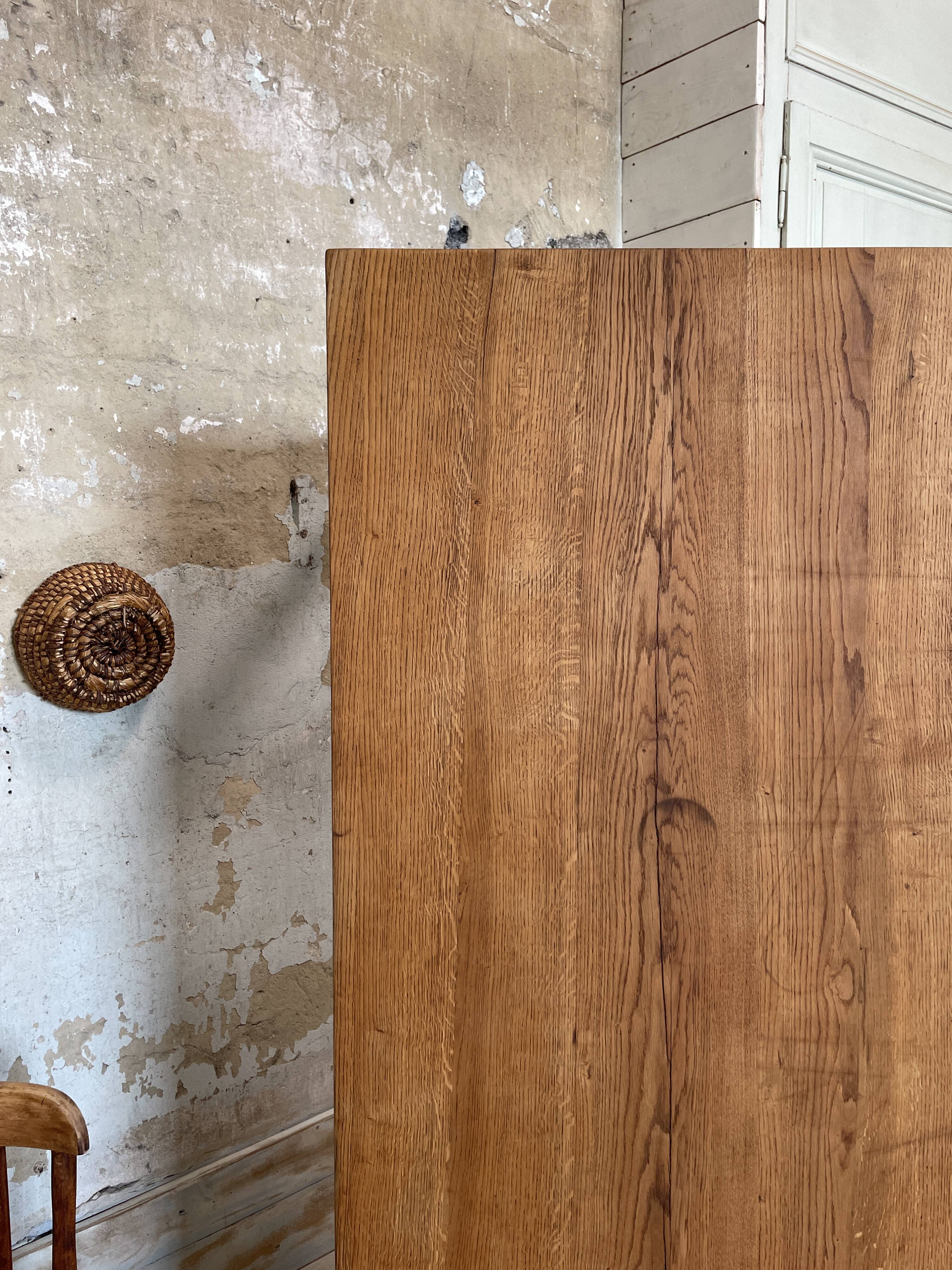Vintage farm table with spindle legs.