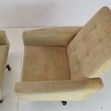 Pair of mid-century swivel armchairs with wheels 1970's