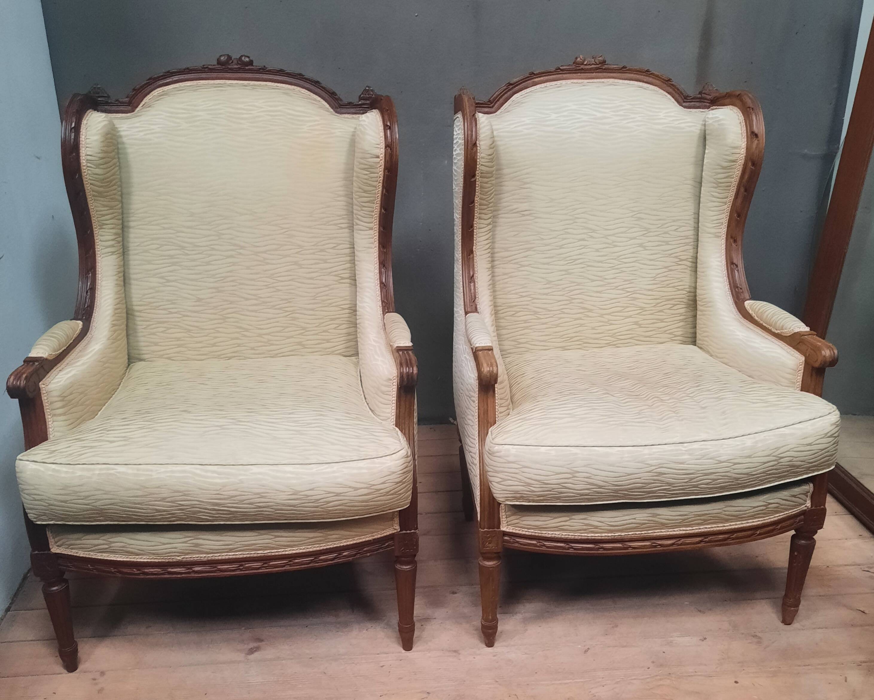 Pair of wingback armchairs in Louis XVI style