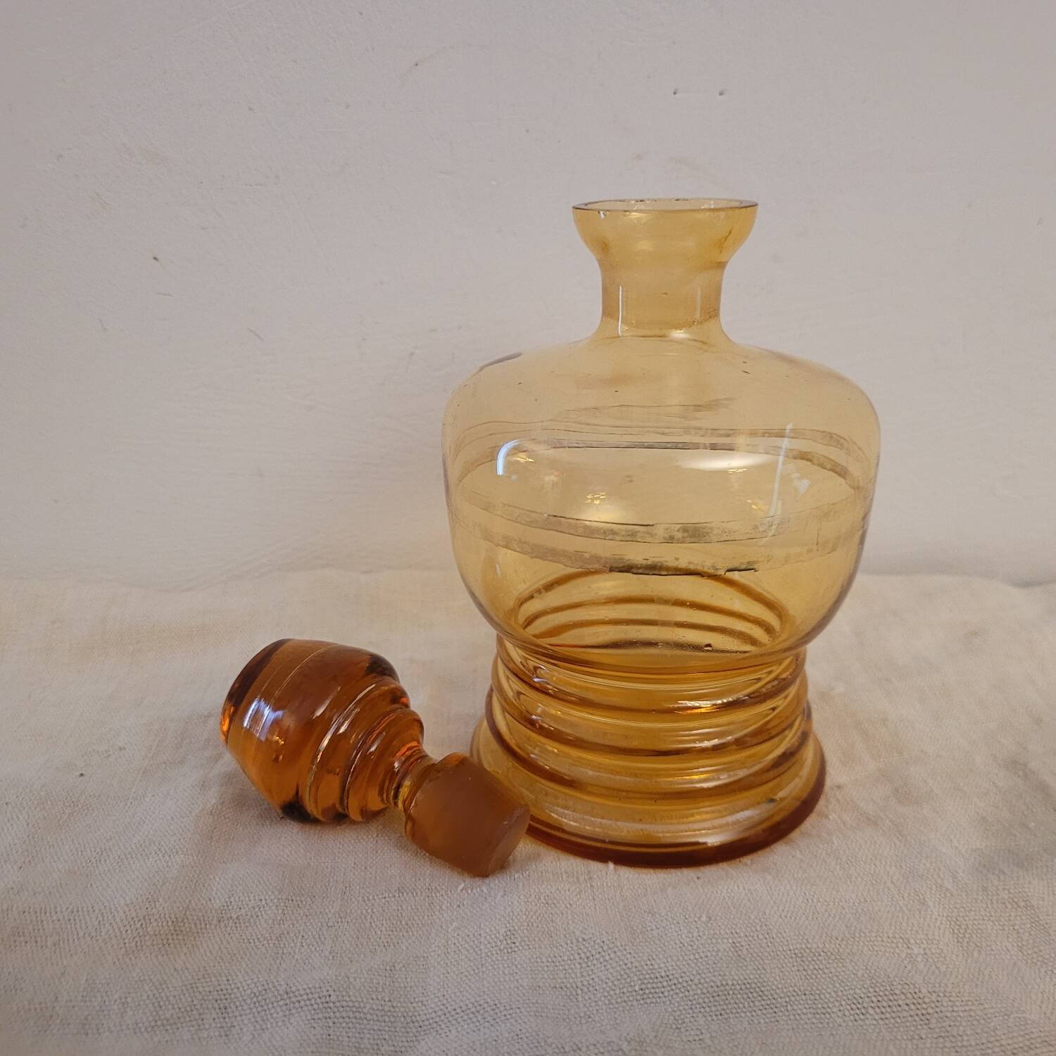 Vintage amber glass carafe with gold trim – 1950s