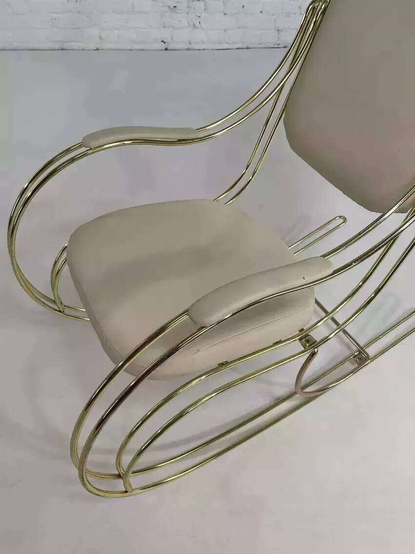 1960s rocking chair in brass and ecru imitation leather