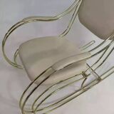 1960s rocking chair in brass and ecru imitation leather