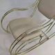 1960s rocking chair in brass and ecru imitation leather
