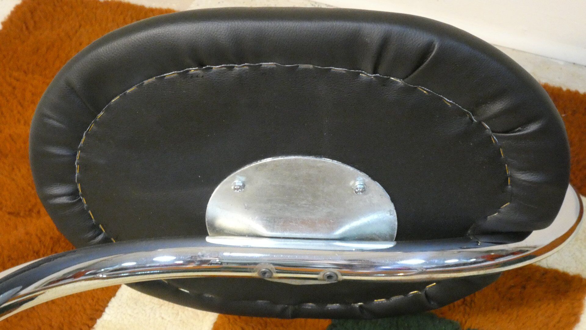 Cobra chairs in steel and black leather by Giotto Stoppino, 1970s, set of 5.