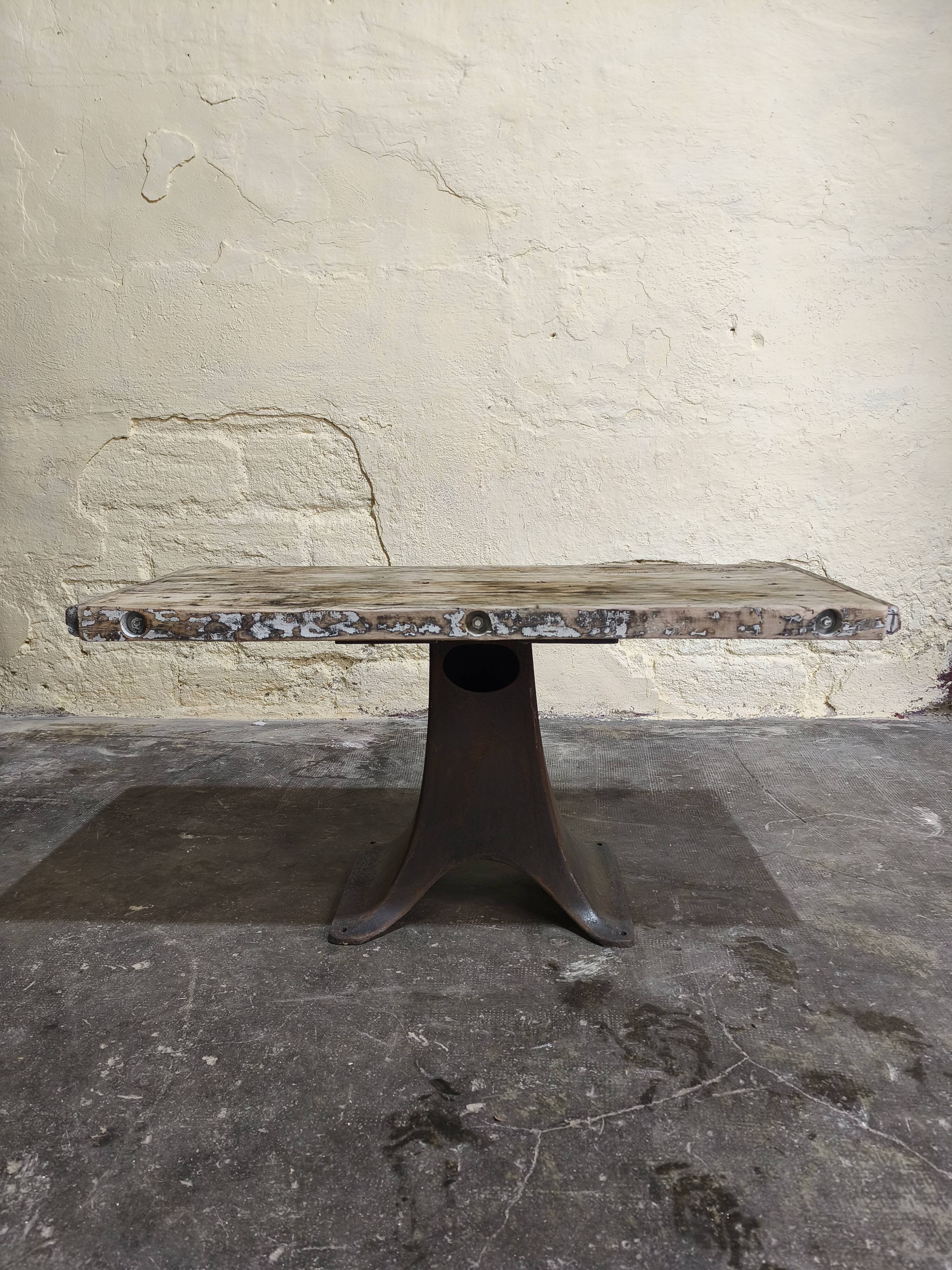 Solid oak coffee table with industrial cast iron legs