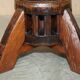Antique captain's swivel chair on a draft horse wheel from around 1760.