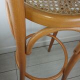 Stunt and curved wood bar stool