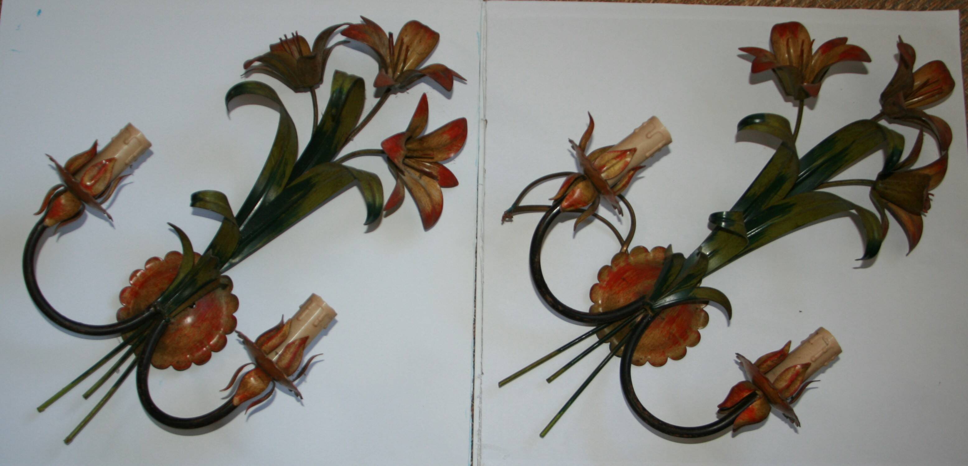 Pair of vintage floral wall sconces in Italian Florentine style metal.