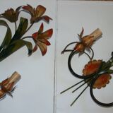 Pair of vintage floral wall sconces in Italian Florentine style metal.