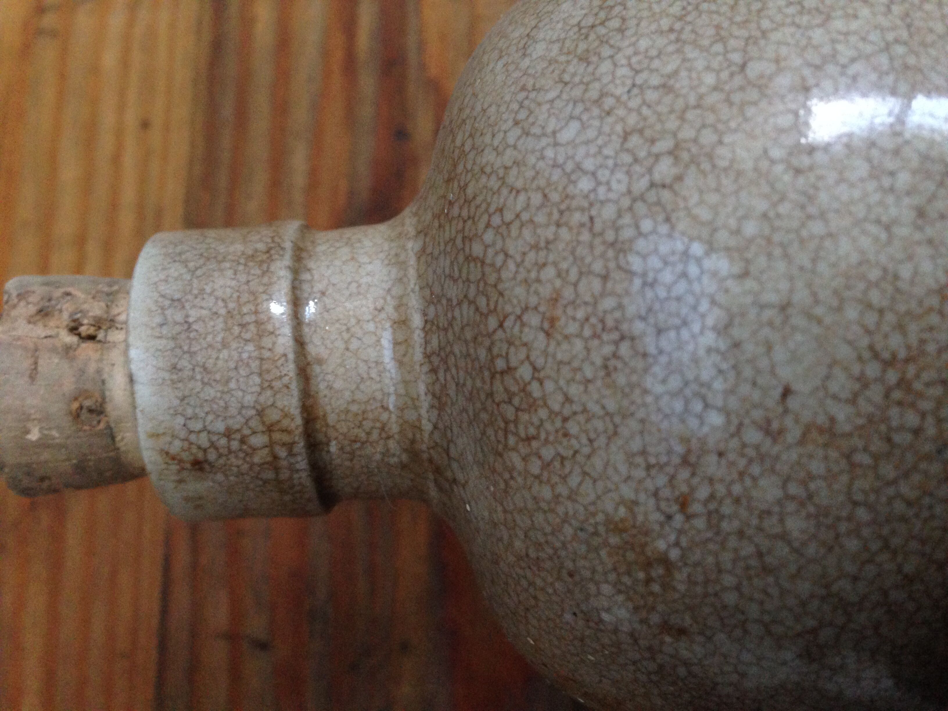 Enamelled stoneware bottle