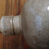 Enamelled stoneware bottle