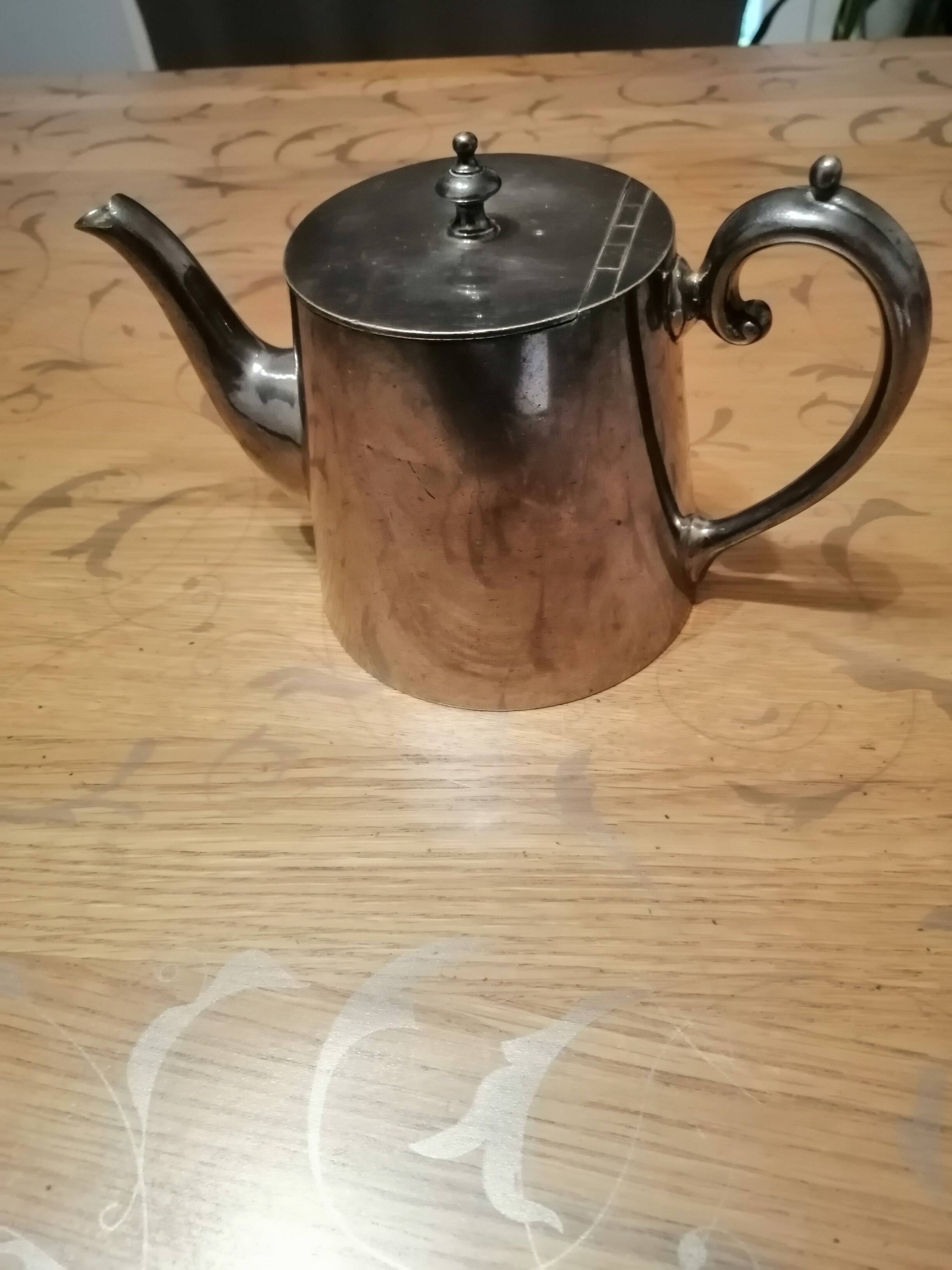 silver-plated teapot
