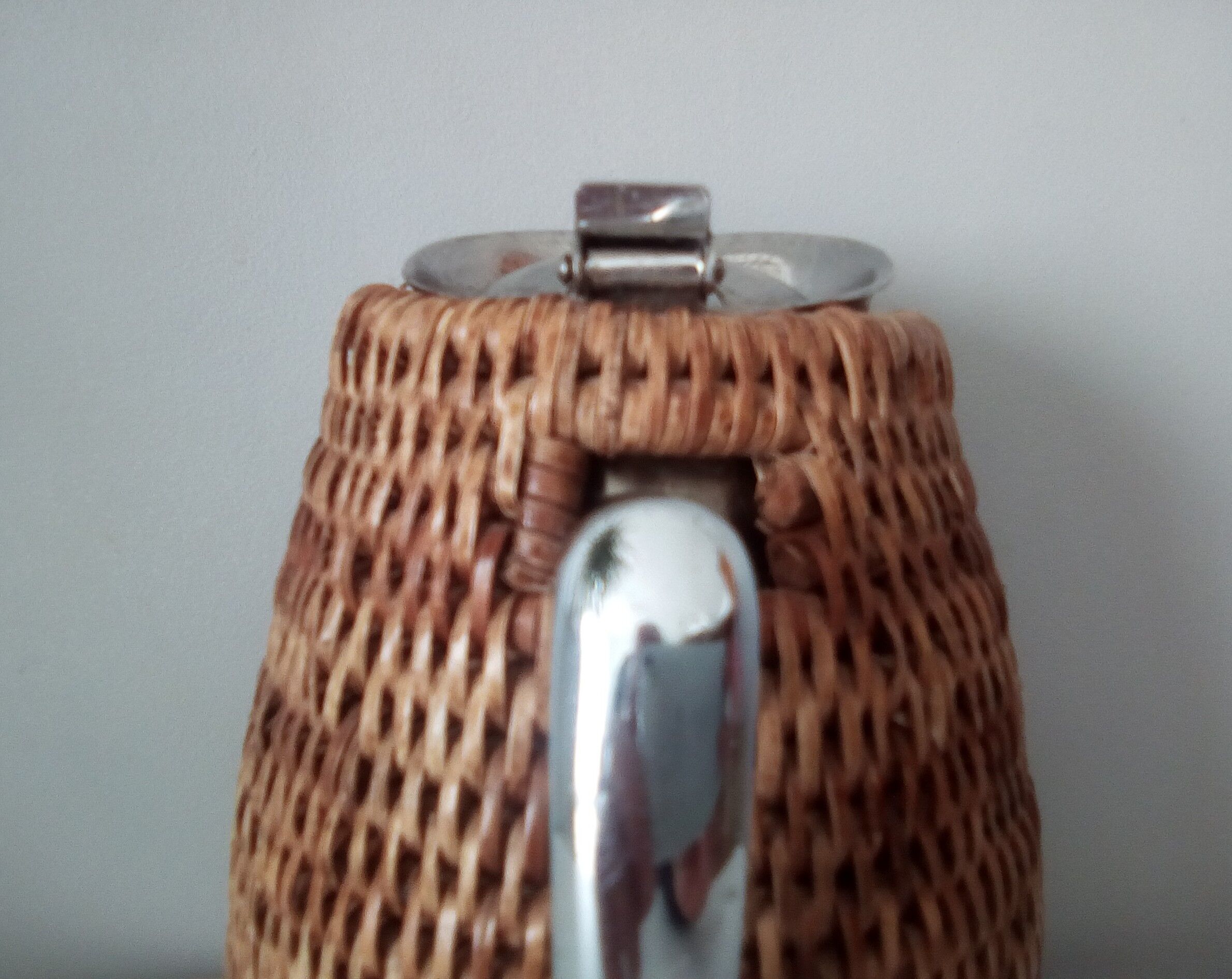 1980s rattan stainless steel pitcher