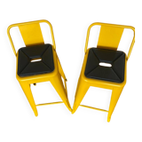 Pair of yellow Tolix high chairs