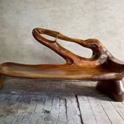 Sculptural bench in solid wood