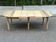 Table à manger ronde extensible à volets décapée en chêne brut 4 rallonges