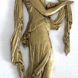 Pair of gilded bronze bas-reliefs of women