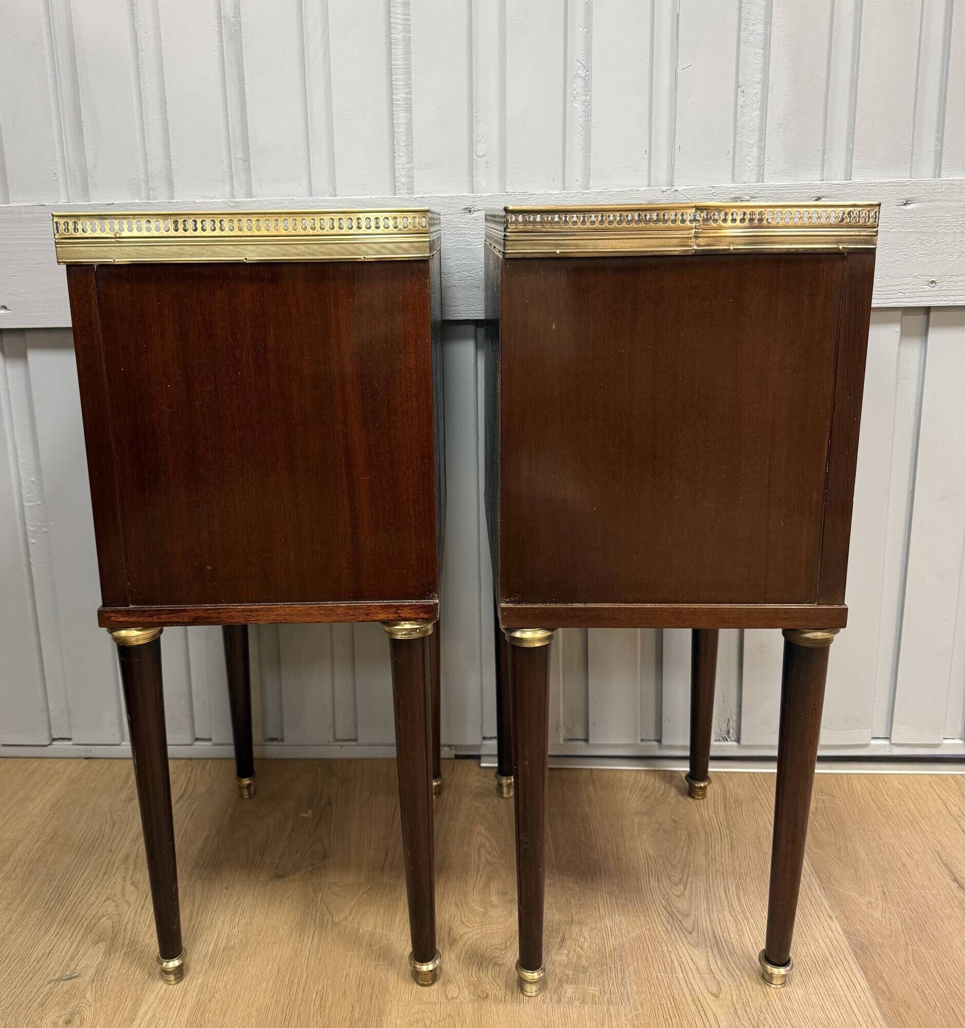 Pair of Louis XVI style bedside tables in mahogany