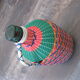 Vintage and multi-coloured demijohn