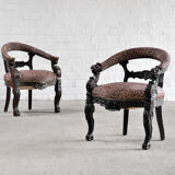 Antique renaissance style 19th century carved oak tub chairs with leopard print upholstery, set of 2
