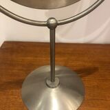 Tilting table mirror