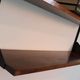 Shelves in rosewood and black lacquered metal from the 50s
