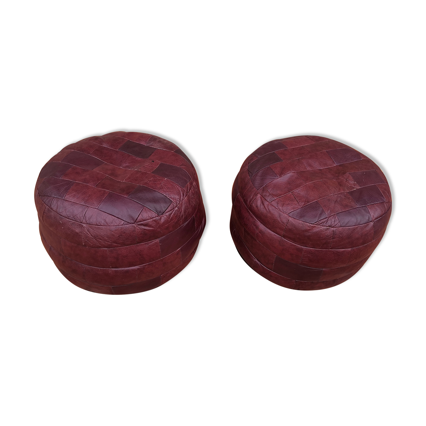Pair of vintage poufs in burgundy leather patchwork, 1970