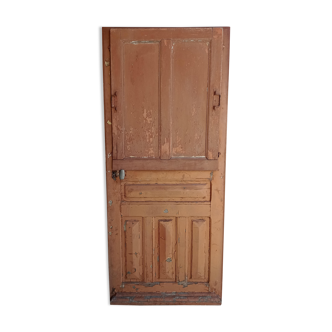 Old glazed door with its shutter