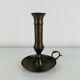Vintage brass candlestick that raises and lowers.