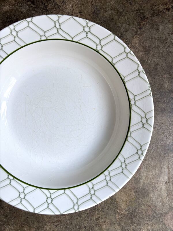 Grand plat rond creux Christian Dior en faïence italienne