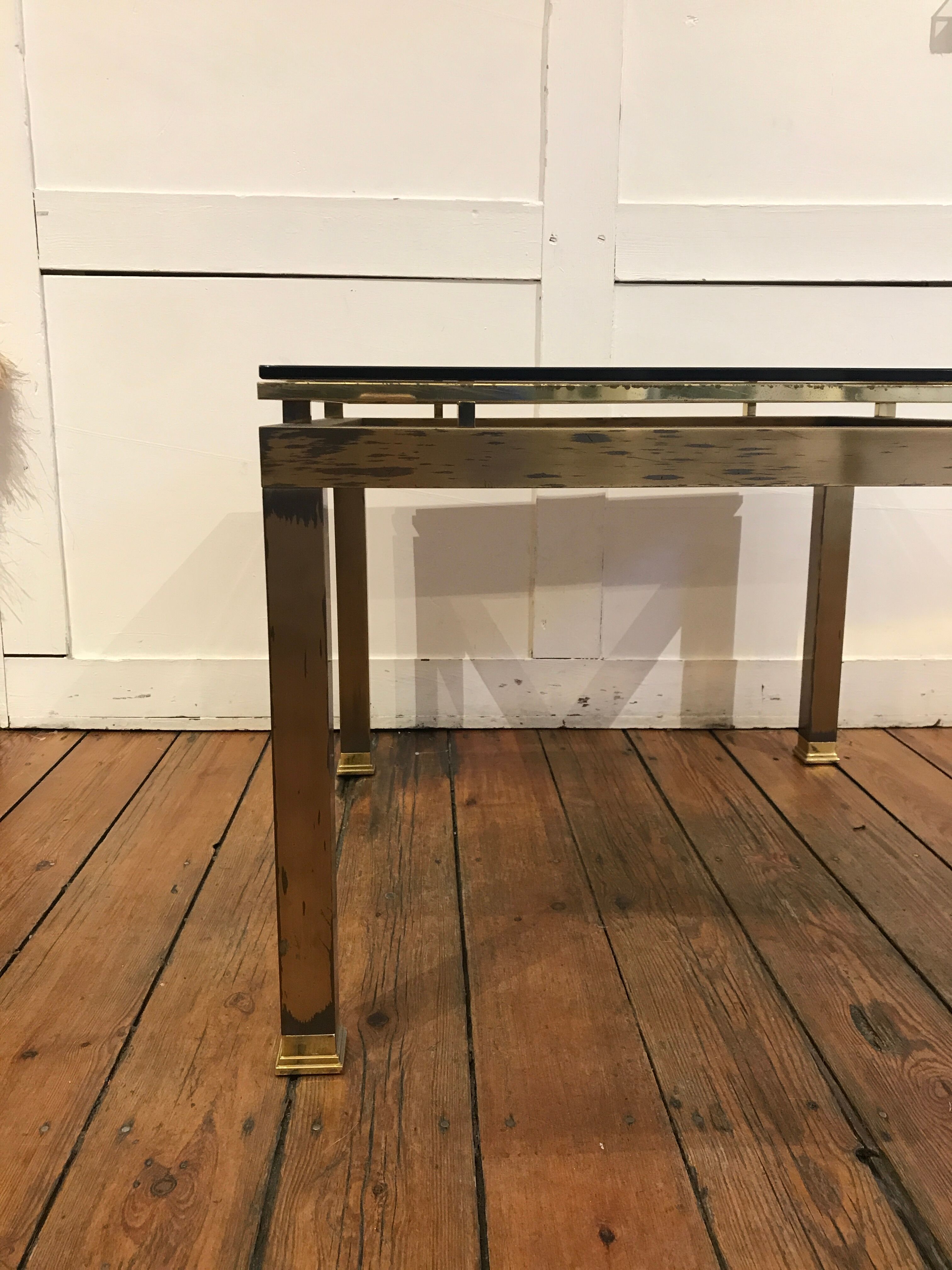 Table basse métal doré 1970