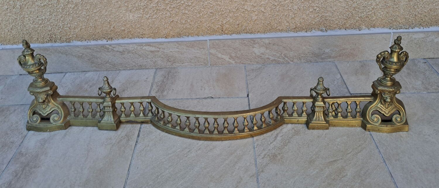 Louis XVI style bronze andirons and fireplace bar