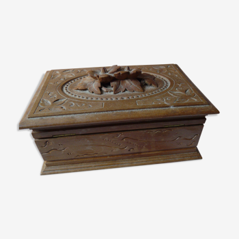 Carved jewelry box upholstered interior
