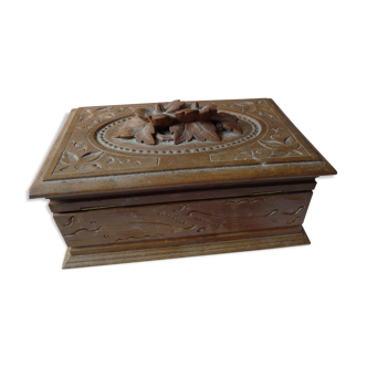 Carved jewelry box upholstered interior