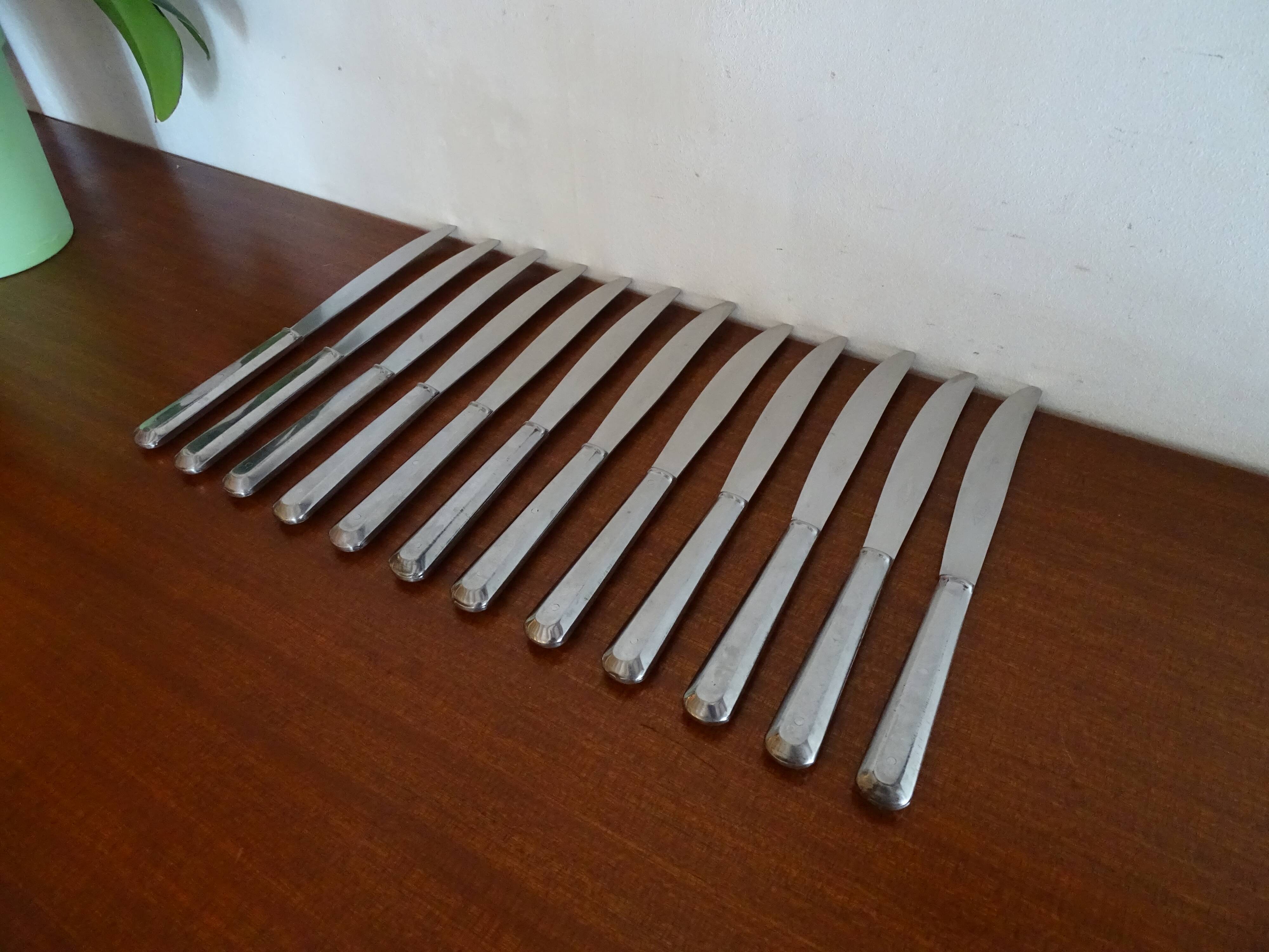 12 vintage Alpinox knives