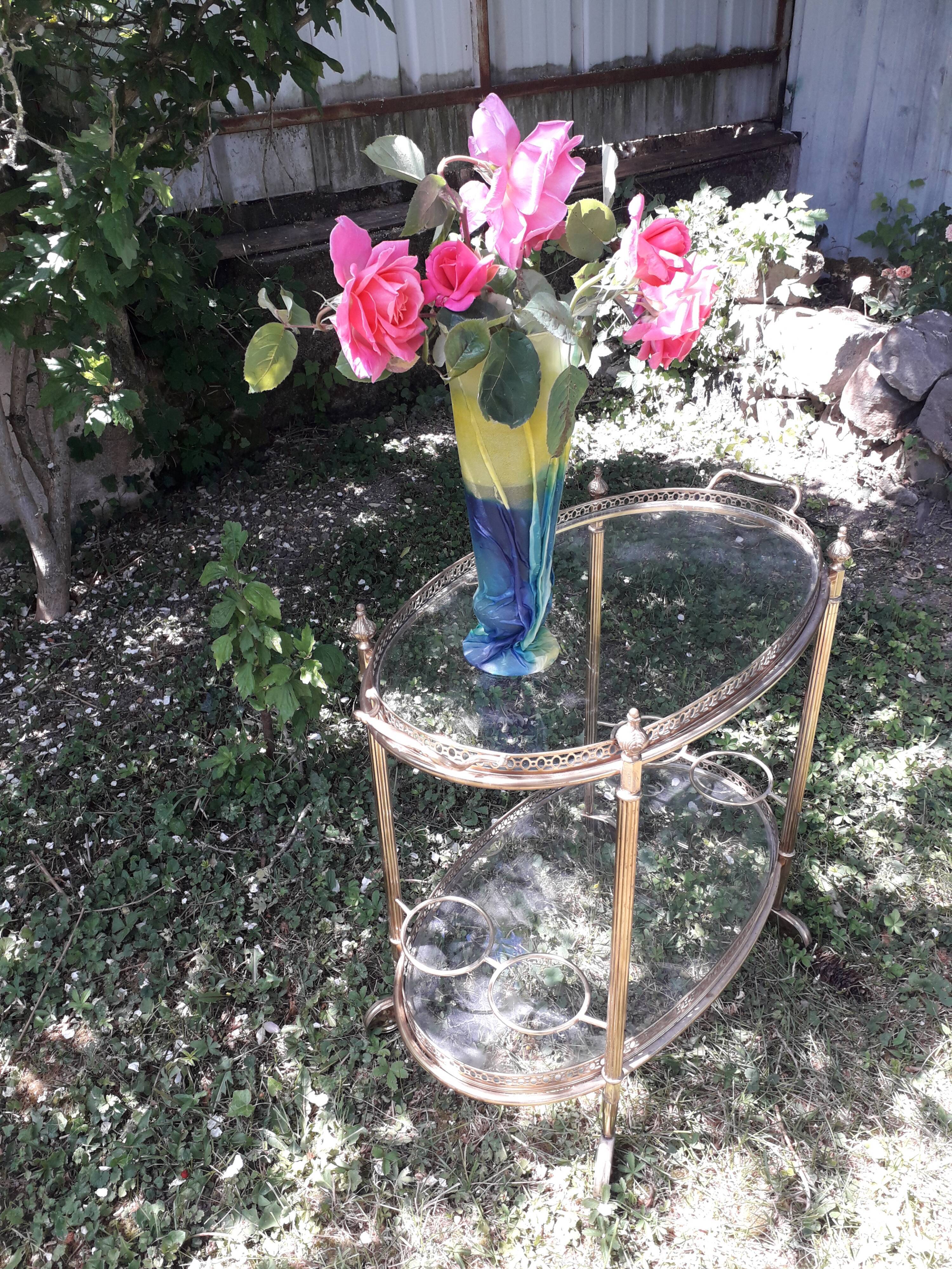 Dessert on brass wheels and glass door bottles year 60