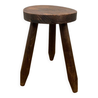 Small brutalist tripod stool in solid wood.