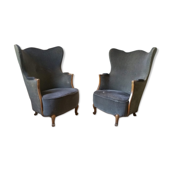 Paire de fauteuils Bergère tonneau sculpturale
