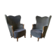 Paire de fauteuils Bergère tonneau sculpturale
