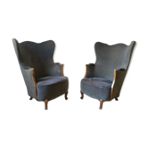 Paire de fauteuils Bergère tonneau sculpturale