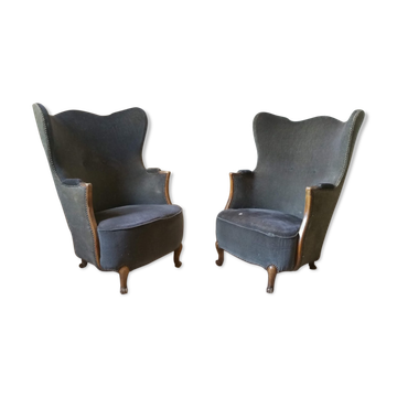 Paire de fauteuils Bergère tonneau sculpturale